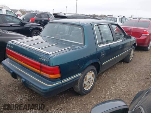1993 Dodge Spirit with VIN 1B3XA46K5PF605264, listed as a IAAI auction lot 41561970 with 94,670 mi miles and . Bid and sale history available at DreamBid. Image 4.