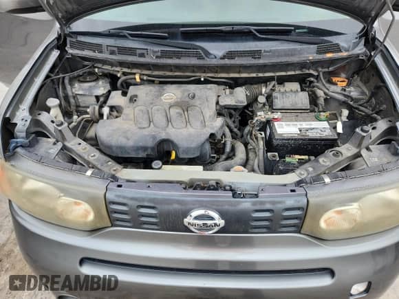 2012 Nissan Cube S z VIN JN8AZ2KRXCT253626, wystawiony jako Copart lot #60837345 z przebiegiem 173 601 mil mil oraz Szkoda całkowita • Salvage title. Historia ofert i sprzedaży dostępna na DreamBid. Obrazek 11.