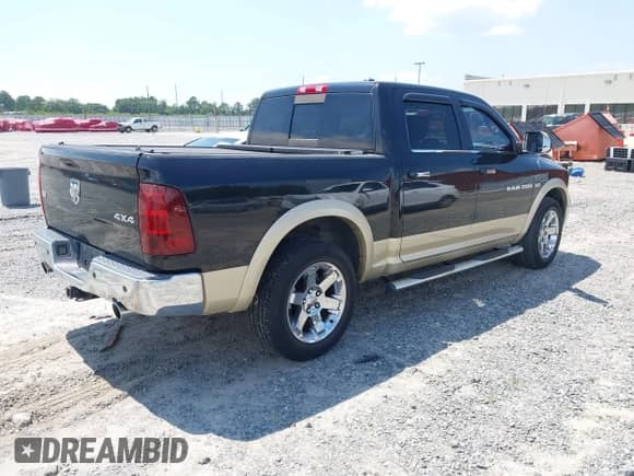 2011 Ram 1500 Outdoorsman with VIN 1D7RV1CT2BS531766, listed as a IAAI auction lot 42667044 with 220,722 mi miles and . Bid and sale history available at DreamBid. Image 4.