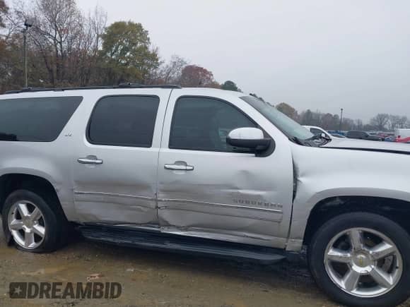 2014 Chevrolet Suburban LTZ с VIN 1GNSCKE05ER173446, выставлен на аукционе IAAI как лот 41047096 с пробегом 189 049 миль миль и . История ставок и продаж доступна на DreamBid. Изображение 6.
