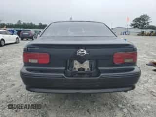 1996 Chevrolet Caprice 1SA Special Value z VIN 1G1BL52P8TR141169, wystawiony jako Copart lot #57903565 z przebiegiem Nie podano mil oraz Szkoda całkowita • Salvage title. Historia ofert i sprzedaży dostępna na DreamBid. Obrazek 6.