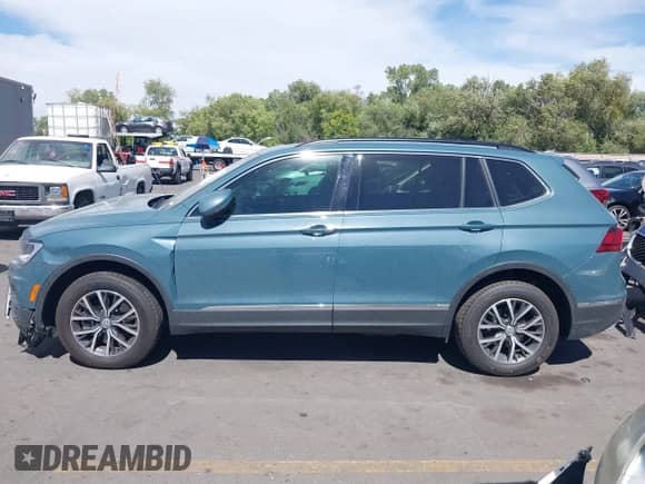 2020 Volkswagen Tiguan SE с VIN 3VV2B7AX4LM064018, выставлен на аукционе IAAI как лот 43189376 с пробегом 77 543 миль миль и . История ставок и продаж доступна на DreamBid. Изображение 14.