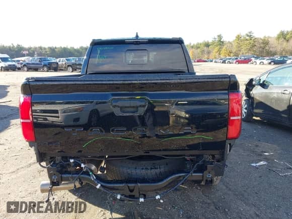 2024 Toyota Tacoma SR5 with VIN 3TMLB5JN0RM008463, listed as a IAAI auction lot 40979020 with 4,710 mi miles and . Bid and sale history available at DreamBid. Image 17.