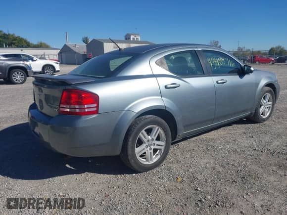 2010 Dodge Avenger R/T with VIN 1B3CC5FB3AN227425, listed as a IAAI auction lot 43488716 with 164,223 mi miles and . Bid and sale history available at DreamBid. Image 4.
