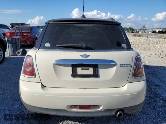 2013 MINI Hardtop with VIN WMWSU3C54DT677401, listed as a Copart auction lot 86124985 with 65,263 mi miles and Salvage title. Bid and sale history available at DreamBid. Image 6.