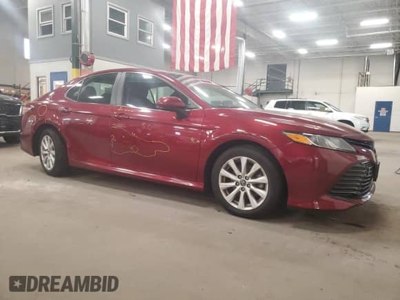 2020 Toyota Camry LE с VIN 4T1C11AKXLU304221, выставлен на аукционе Copart как лот 71566835 с пробегом 159 771 миль миль и Списание • Salvage title. История ставок и продаж доступна на DreamBid. Изображение 4.