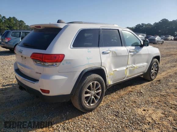 2014 Jeep Grand Cherokee Limited with VIN 1C4RJFBG0EC227146, listed as a Copart auction lot 84939615 with 130,938 mi miles and Salvage title. Bid and sale history available at DreamBid. Image 3.