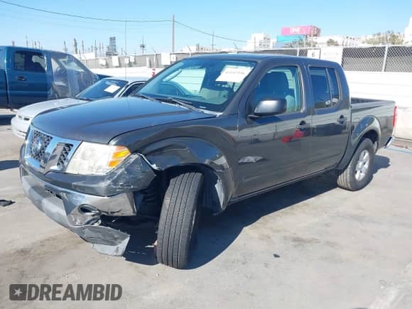 2010 Nissan Frontier SE with VIN 1N6AD0ER8AC426452, listed as a IAAI auction lot 43152356 with 214,616 mi miles and . Bid and sale history available at DreamBid. Image 2.