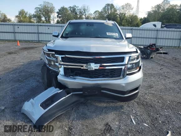 2019 Chevrolet Suburban LT с VIN 1GNSKHKC1KR159219, выставлен на аукционе Copart как лот 84354715 с пробегом 71 601 миль миль и Списание • Salvage title. История ставок и продаж доступна на DreamBid. Изображение 5.