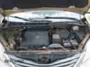 2012 Toyota Sienna XLE z VIN 5TDDK3DCXCS047040, wystawiony jako IAAI lot #41494904 z przebiegiem 117 696 mil mil oraz . Historia ofert i sprzedaży dostępna na DreamBid. Obrazek 10.