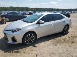 2019 Toyota Corolla L with VIN 5YFBURHE6KP860379, listed as a Copart auction lot 71119135 with Not provided miles and Salvage title. Bid and sale history available at DreamBid. Image 1.