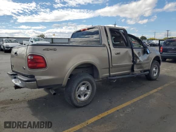2003 Ford F-150 XLT with VIN 1FTRW08L93KB25558, listed as a Copart auction lot 81910345 with 169,885 mi miles and Salvage title. Bid and sale history available at DreamBid. Image 3.
