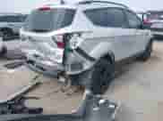 2018 Ford Escape SE z VIN 1FMCU9GD9JUC78285, wystawiony jako IAAI lot #43092402 z przebiegiem 111 326 mil mil oraz . Historia ofert i sprzedaży dostępna na DreamBid. Obrazek 4.