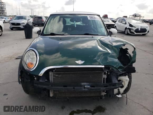 2012 MINI Hardtop с VIN WMWSU3C5XCT184918, выставлен на аукционе Copart как лот 59039755 с пробегом 126 185 миль миль и Списание • Salvage title. История ставок и продаж доступна на DreamBid. Изображение 5.