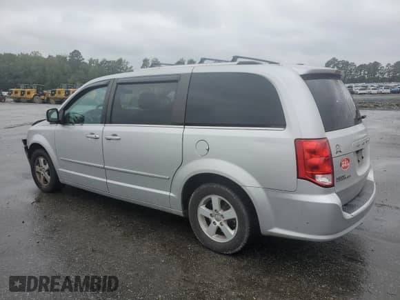2011 Dodge Grand Caravan Crew with VIN 2D4RN5DG0BR756341, listed as a Copart auction lot 84214165 with 172,683 mi miles and Salvage title. Bid and sale history available at DreamBid. Image 2.