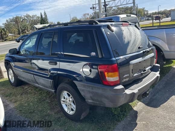 2004 Jeep Grand Cherokee Laredo z VIN 1J4GX48N24C436753, wystawiony jako Copart lot #88142905 z przebiegiem 114 022 mil mil oraz Czysty tytuł • Clean title. Historia ofert i sprzedaży dostępna na DreamBid. Obrazek 3.