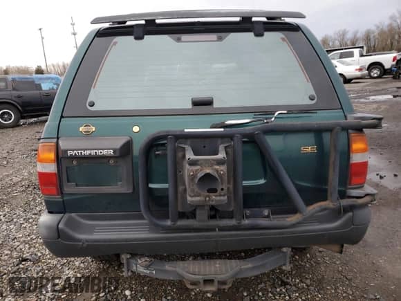 1997 Nissan Pathfinder XE z VIN JN8AR05Y2VW147485, wystawiony jako Copart lot #85934534 z przebiegiem 193 731 mil mil oraz Szkoda całkowita • Salvage title. Historia ofert i sprzedaży dostępna na DreamBid. Obrazek 6.