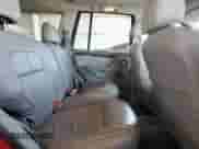 2002 Jeep Grand Cherokee Limited with VIN 1J4GW58N12C202691, listed as a Copart auction lot 64265975 with 118,480 mi miles and Salvage title. Bid and sale history available at DreamBid. Image 11.