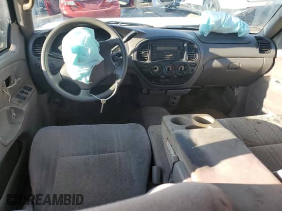 2004 Toyota Tundra SR5 z VIN 5TBBT44114S454246, wystawiony jako Copart lot #85520744 z przebiegiem 211 199 mil mil oraz Szkoda całkowita • Salvage title. Historia ofert i sprzedaży dostępna na DreamBid. Obrazek 8.