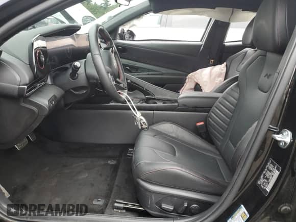 2025 Hyundai Elantra N Line z VIN KMHLR4DF1SU916637, wystawiony jako Copart lot #69233515 z przebiegiem 21 702 mil mil oraz Czysty tytuł • Clean title. Historia ofert i sprzedaży dostępna na DreamBid. Obrazek 7.