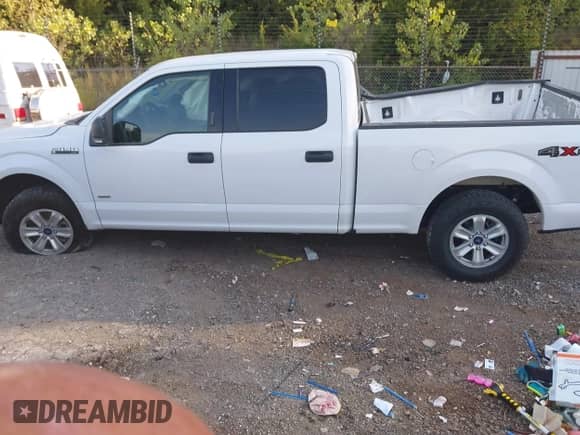 2017 Ford F-150 XLT with VIN 1FTFW1EG6HKD77811, listed as a IAAI auction lot 43137609 with 156,403 mi miles and . Bid and sale history available at DreamBid. Image 14.