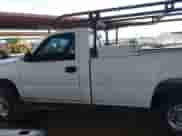2005 Chevrolet Silverado 2500HD Work Truck with VIN 1GCHC24U05E275672, listed as a IAAI auction lot 42243540 with 179,665 mi miles and . Bid and sale history available at DreamBid. Image 15.