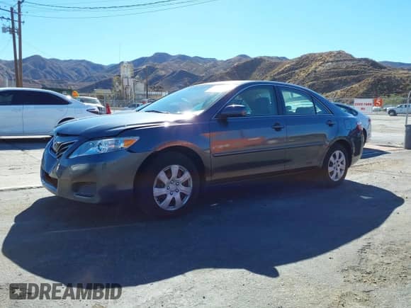 2011 Toyota Camry LE with VIN JTNBF3EK0B3006476, listed as a IAAI auction lot 43470079 with 113,317 mi miles and . Bid and sale history available at DreamBid. Image 2.