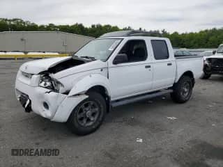 2003 Nissan Frontier XE с VIN 1N6ED27TX3C448980, выставлен на аукционе Copart как лот 58802985 с пробегом 99 999 миль миль и Списание • Salvage title. История ставок и продаж доступна на DreamBid. Изображение 1.