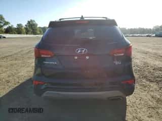 2017 Hyundai Santa Fe 2.4L z VIN 5NMZUDLB2HH002442, wystawiony jako Copart lot #70480155 z przebiegiem 90 121 mil mil oraz Szkoda całkowita • Salvage title. Historia ofert i sprzedaży dostępna na DreamBid. Obrazek 6.