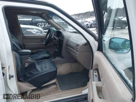 2002 Nissan Pathfinder SE with VIN JN8DR09Y02W720483, listed as a IAAI auction lot 41382772 with 182,531 mi miles and . Bid and sale history available at DreamBid. Image 5.