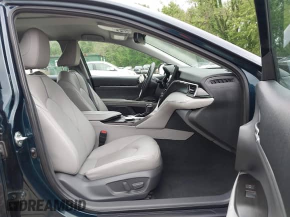 2021 Toyota Camry Hybrid XLE with VIN 4T1F31AK8MU563752, listed as a IAAI auction lot 42134620 with 19,484 mi miles and . Bid and sale history available at DreamBid. Image 5.