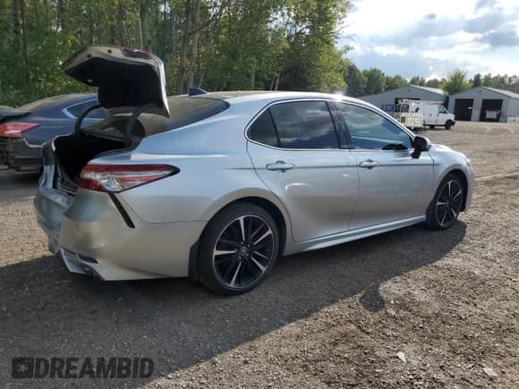 2018 Toyota Camry XSE с VIN 4T1B61HK2JU003314, выставлен на аукционе Copart как лот 71150045 с пробегом 99 571 миль миль и Списание • Salvage title. История ставок и продаж доступна на DreamBid. Изображение 3.