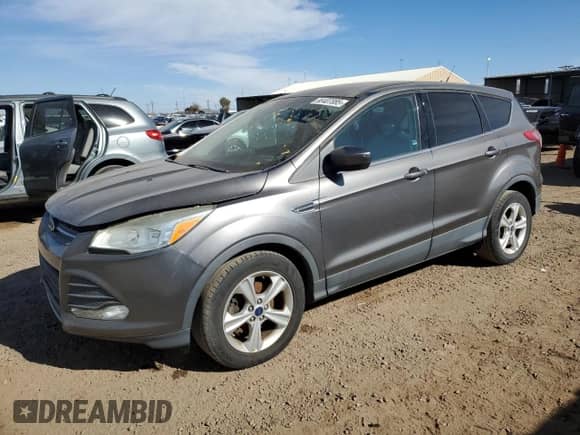 2014 Ford Escape SE with VIN 1FMCU0GX7EUC59634, listed as a Copart auction lot 90407085 with 145,176 mi miles and Clean title. Bid and sale history available at DreamBid. Image 1.