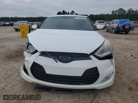 2017 Hyundai Veloster Value Edition с VIN KMHTC6AD8HU319400, выставлен на аукционе Copart как лот 71875325 с пробегом 114 417 миль миль и Списание • Salvage title. История ставок и продаж доступна на DreamBid. Изображение 5.