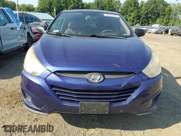 2011 Hyundai Tucson GL z VIN KM8JT3AB6BU120700, wystawiony jako Copart lot #68202495 z przebiegiem 164 783 mil mil oraz Szkoda całkowita • Salvage title. Historia ofert i sprzedaży dostępna na DreamBid. Obrazek 5.
