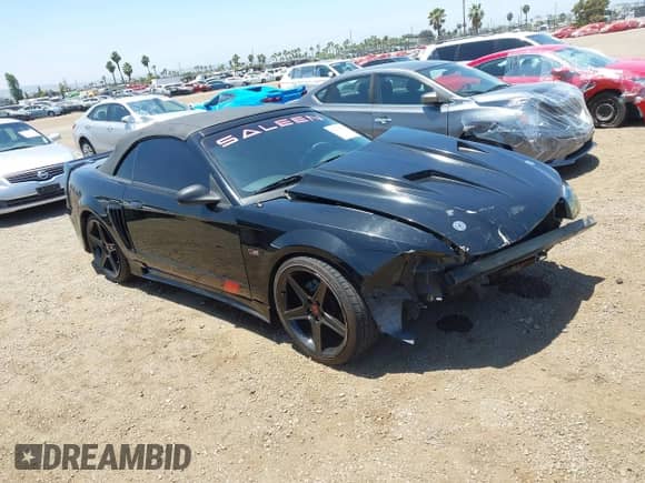 2002 Ford Mustang GT Deluxe z VIN 1FAFP45X92F229236, wystawiony jako IAAI lot #42565552 z przebiegiem 122 504 mil mil oraz . Historia ofert i sprzedaży dostępna na DreamBid. Obrazek 1.