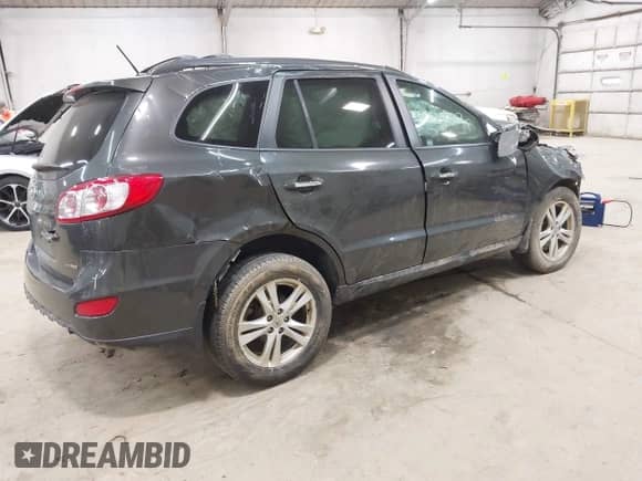 2012 Hyundai Santa Fe Limited с VIN 5XYZKDAG4CG112979, выставлен на аукционе IAAI как лот 43051717 с пробегом 164 154 миль миль и . История ставок и продаж доступна на DreamBid. Изображение 4.