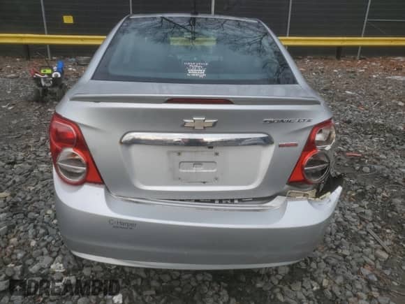 2014 Chevrolet Sonic LTZ with VIN 1G1JE5SB4E4201684, listed as a Copart auction lot 43089345 with 161,948 mi miles and Salvage title. Bid and sale history available at DreamBid. Image 6.