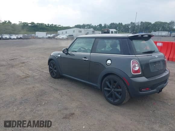 2011 MINI Hardtop S with VIN WMWSV3C58BTY13412, listed as a IAAI auction lot 42516587 with 124,831 mi miles and . Bid and sale history available at DreamBid. Image 3.