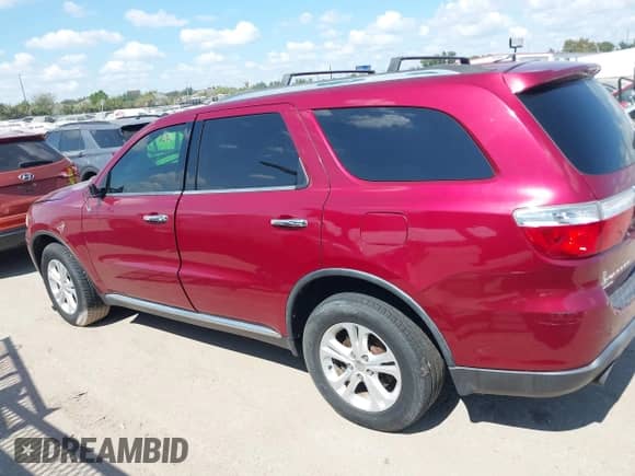 2013 Dodge Durango Crew with VIN 1C4SDJDT5DC565632, listed as a IAAI auction lot 43414719 with 130,151 mi miles and . Bid and sale history available at DreamBid. Image 14.