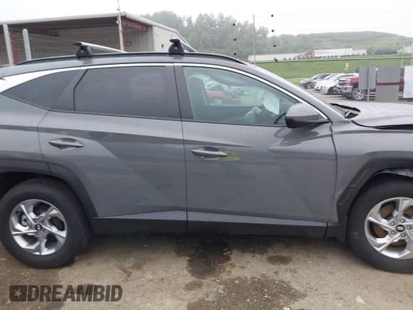 2024 Hyundai Tucson SEL z VIN 5NMJBCDE2RH405098, wystawiony jako IAAI lot #42766392 z przebiegiem 3 902 mil mil oraz . Historia ofert i sprzedaży dostępna na DreamBid. Obrazek 13.