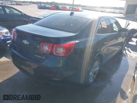 2013 Chevrolet Malibu LTZ z VIN 1G11H5SA3DF343414, wystawiony jako IAAI lot #43434471 z przebiegiem 201 504 mil mil oraz . Historia ofert i sprzedaży dostępna na DreamBid. Obrazek 4.