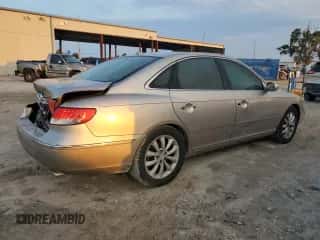 2007 Hyundai Azera SE с VIN KMHFC46F67A228508, выставлен на аукционе Copart как лот 71537224 с пробегом 123 218 миль миль и Списание • Salvage title. История ставок и продаж доступна на DreamBid. Изображение 3.
