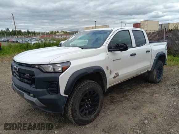 2023 Chevrolet Colorado 4WD Trail Boss with VIN 1GCPTEEK8P1147894, listed as a Copart auction lot 67809825 with 26,903 mi miles and Clean title. Bid and sale history available at DreamBid. Image 1.