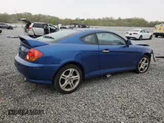 2004 Hyundai Tiburon GT с VIN KMHHN65F04U116166, выставлен на аукционе Copart как лот 51525065 с пробегом 153 035 миль миль и Списание • Salvage title. История ставок и продаж доступна на DreamBid. Изображение 3.