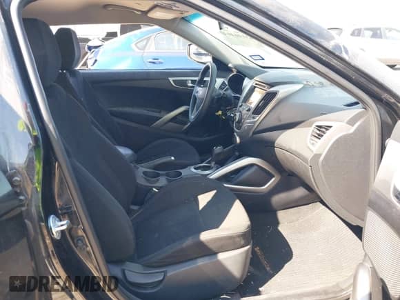 2016 Hyundai Veloster z VIN KMHTC6AD0GU256386, wystawiony jako IAAI lot #43146464 z przebiegiem 75 645 mil mil oraz . Historia ofert i sprzedaży dostępna na DreamBid. Obrazek 5.