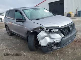 2021 Honda Passport EX-L with VIN 5FNYF7H58MB015332, listed as a IAAI auction lot 42658214 with 99,809 mi miles and . Bid and sale history available at DreamBid. Image 1.