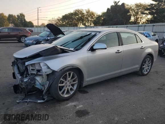 2012 Chevrolet Malibu LTZ with VIN 1G1ZG5E79CF165898, listed as a Copart auction lot 80611505 with 159,645 mi miles and Salvage title. Bid and sale history available at DreamBid. Image 1.