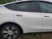 2023 Tesla Model Y Long Range с VIN 7SAYGDEE0PF662251, выставлен на аукционе Copart как лот 81286975 с пробегом Не указан миль и Списание • Salvage title. История ставок и продаж доступна на DreamBid. Изображение 10.