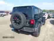 2022 Jeep Wrangler Unlimited Sahara with VIN 1C4JJXP68NW271669, listed as a IAAI auction lot 43277507 with 51,422 mi miles and . Bid and sale history available at DreamBid. Image 4.